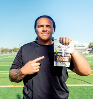 Charlie Pe'a-Shropshire, division 1 football player showing off his favorite almond snacks.