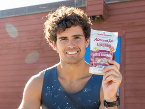 Rex Bales, Captain of the USD Rowing Team, showing off his AlmondRx almonds.
