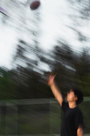 Basketball player taking a shot.