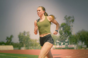 Tessa Buswell sprinting on the track